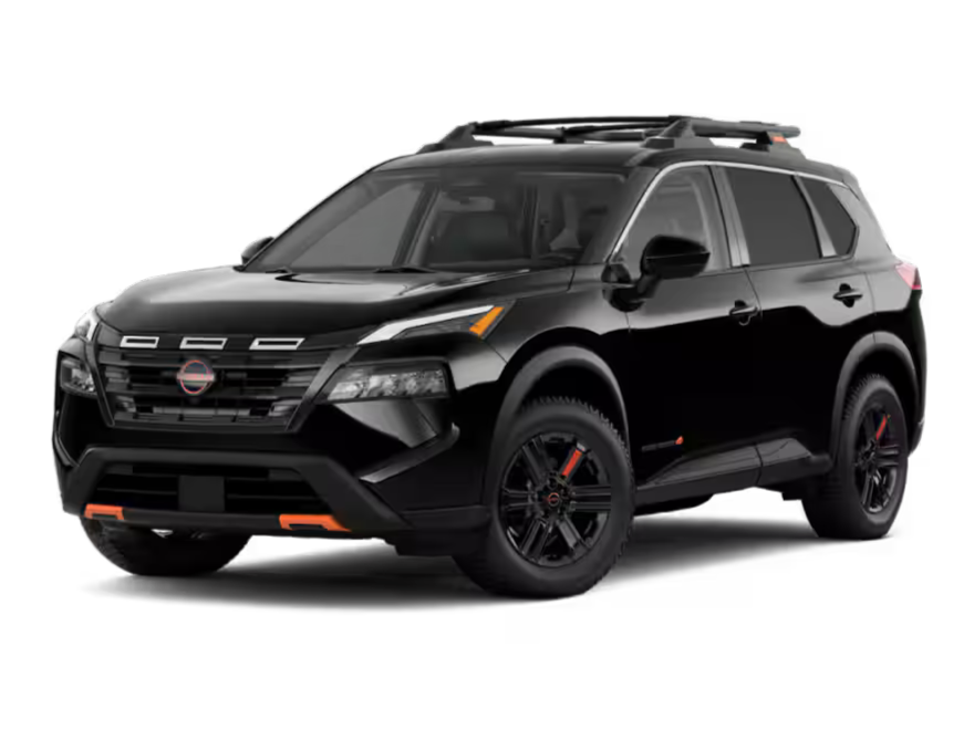Off-road ready 2026 Nissan Rogue Rock Creek with all-terrain tires and a black tubular roof rack